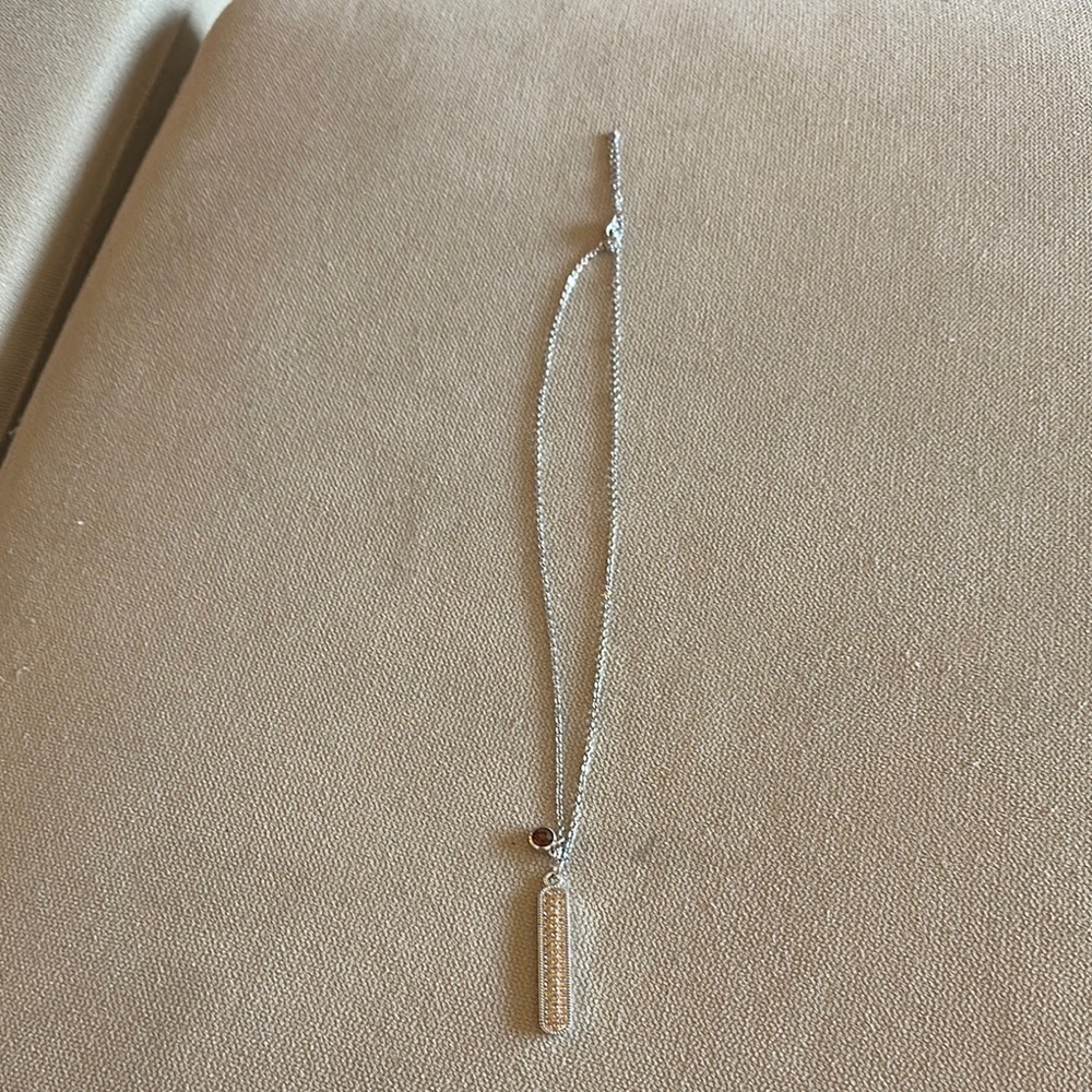 Touchstone Crystal Elegant Necklace with topaz Accents